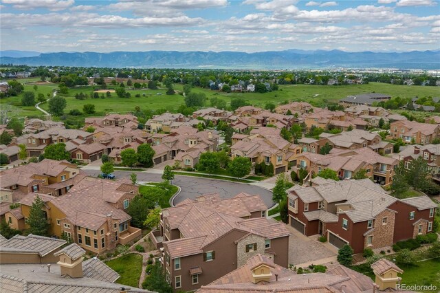 9228 Sori Ln, Highlands Ranch, CO 80126 - aerial view of residential area featuring a mountain backdrop