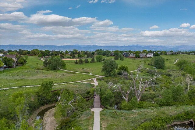 9228 Sori Ln, Highlands Ranch, CO 80126 - aerial overview of property's location featuring mountains and rural landscape