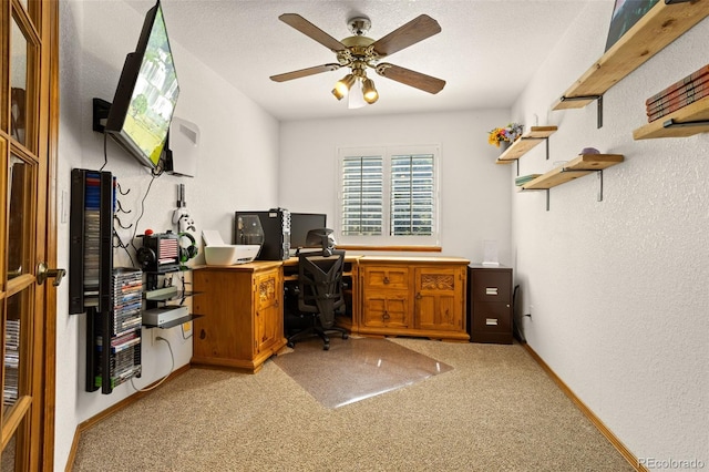 carpeted office with ceiling fan