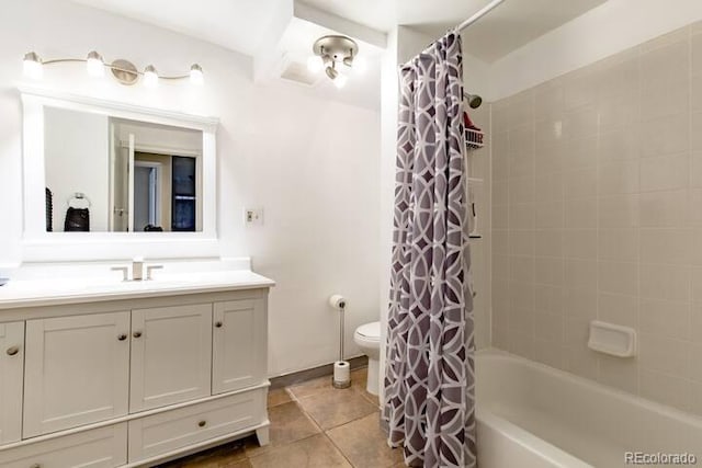 5401 E Warren Ave Unit 105, Denver, CO 80222 - full bath featuring vanity, tile patterned floors, and shower / bath combo