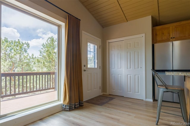 1040 Sheep Ridge Rd, Fairplay, CO 80440 - foyer featuring light wood-style floors, wooden ceiling, and vaulted ceiling