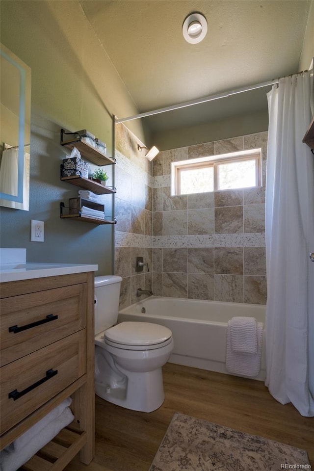 1040 Sheep Ridge Rd, Fairplay, CO 80440 - bathroom featuring wood finished floors, vanity, and shower / bathtub combination with curtain