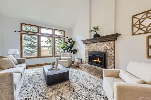 16247 E Belleview Pl, Centennial, CO 80015 - living area featuring a brick fireplace and high vaulted ceiling