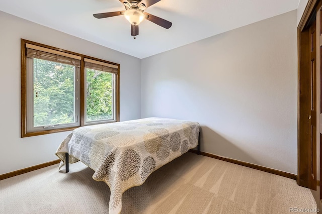 16247 E Belleview Pl, Centennial, CO 80015 - carpeted bedroom with baseboards and ceiling fan