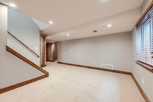 16247 E Belleview Pl, Centennial, CO 80015 - basement with light carpet, stairs, and recessed lighting