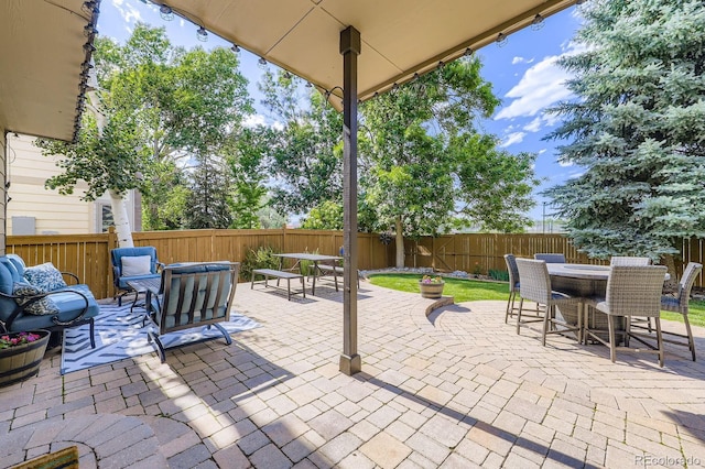 16247 E Belleview Pl, Centennial, CO 80015 - fenced backyard with outdoor dining space and a patio
