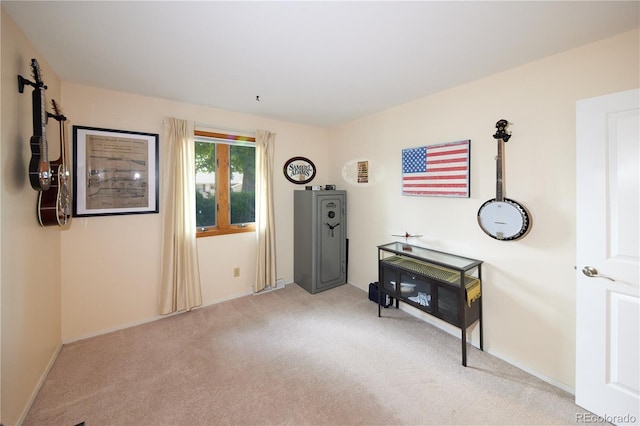 3820 S Harlan St, Denver, CO 80235 - living area with light colored carpet and baseboards