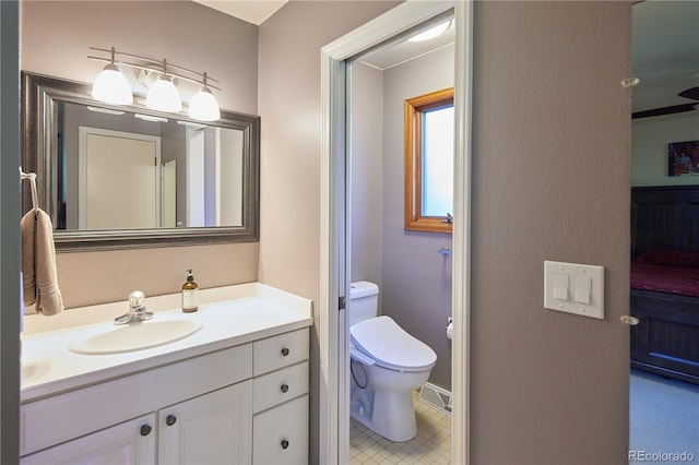 3820 S Harlan St, Denver, CO 80235 - bathroom featuring vanity and tile patterned floors