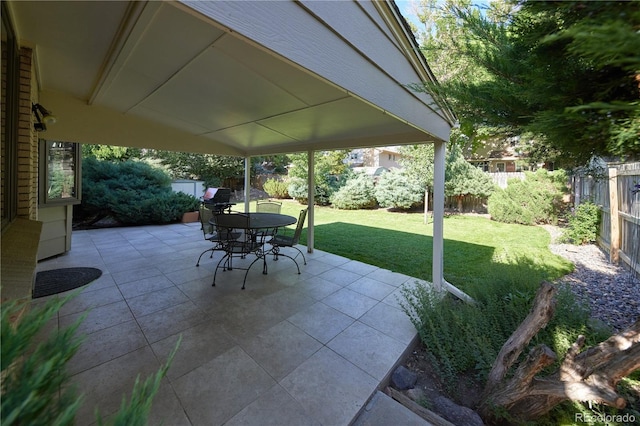 3820 S Harlan St, Denver, CO 80235 - fenced backyard with a patio area and outdoor dining space