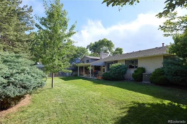 3820 S Harlan St, Denver, CO 80235 - view of yard featuring a patio