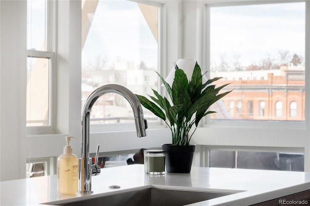 2880 Zuni St Unit 404, Denver, CO 80211 - kitchen view of a sink and light countertops