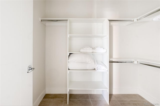 2880 Zuni St Unit 404, Denver, CO 80211 - walk in closet with tile patterned floors
