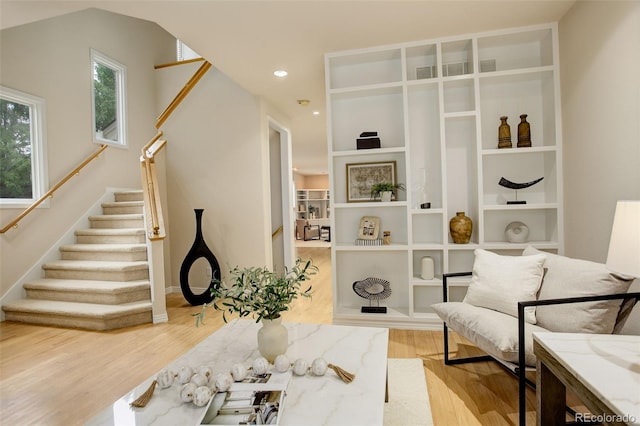 490 Jackson St, Denver, CO 80206 - living area with wood finished floors, stairway, and recessed lighting