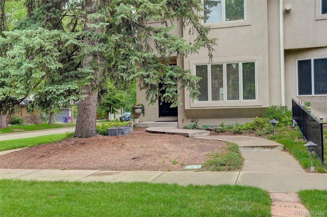 490 Jackson St, Denver, CO 80206 - view of exterior entry featuring stucco siding