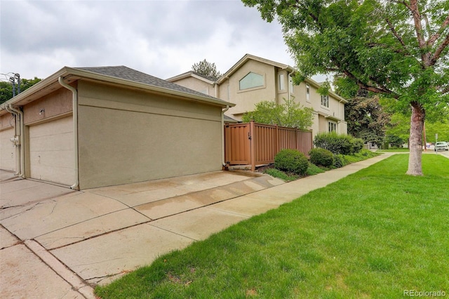 490 Jackson St, Denver, CO 80206 - view of front of home featuring stucco siding and concrete driveway