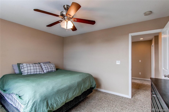 bedroom featuring carpet floors, baseboards, and ceiling fan