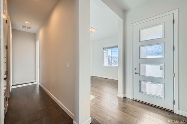 entrance foyer with dark hardwood / wood-style flooring