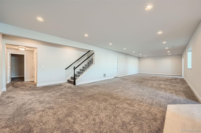 unfurnished living room with carpet flooring