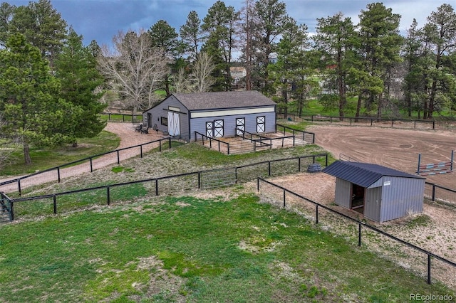 view of property's community featuring an exterior structure and an outdoor structure