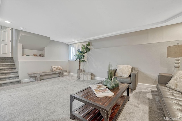 living room with recessed lighting, carpet floors, baseboards, and stairs