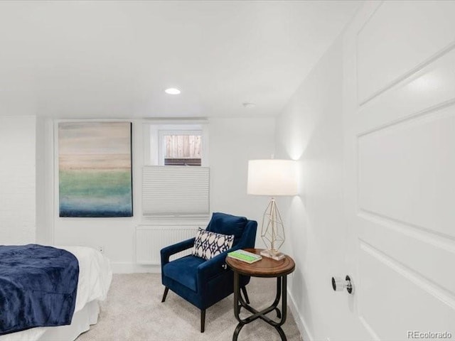 bedroom featuring recessed lighting, radiator, baseboards, and carpet