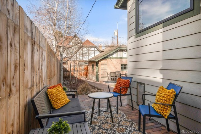 view of patio with fence