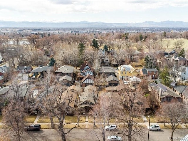 birds eye view of property featuring a mountain view and a residential view