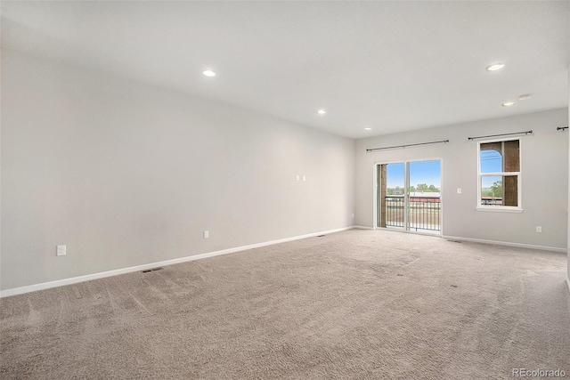 11250 Florence St Unit 29D, Commerce City, CO 80640 - unfurnished room featuring recessed lighting, baseboards, and carpet flooring
