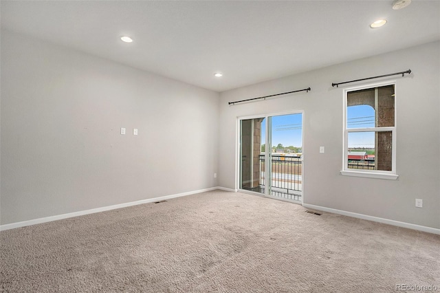 11250 Florence St Unit 29D, Commerce City, CO 80640 - carpeted empty room featuring recessed lighting and baseboards