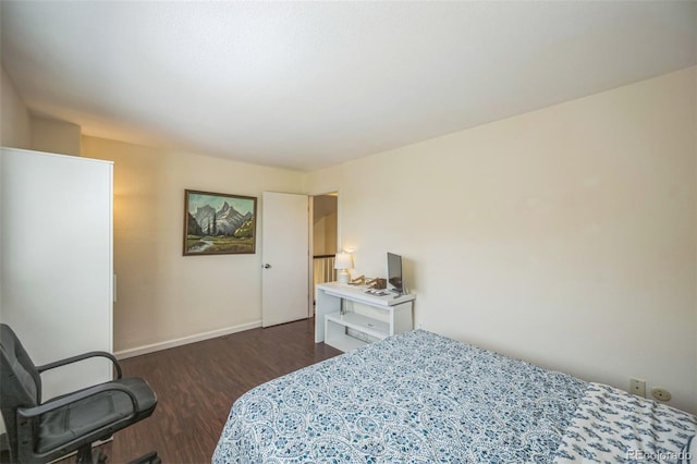 2695 Woodrose Pl, Highlands Ranch, CO 80129 - bedroom featuring dark wood-style floors and baseboards