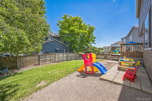 2695 Woodrose Pl, Highlands Ranch, CO 80129 - fenced backyard featuring a playground