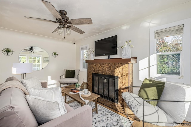 living room with hardwood / wood-style floors and a fireplace