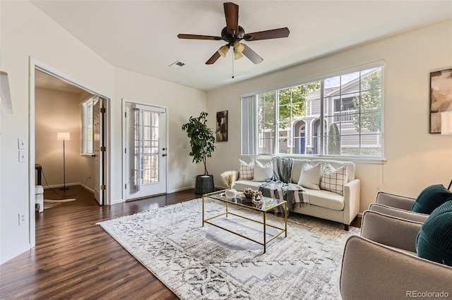 4221 S Blackhawk Cir Unit 7G, Aurora, CO 80014 - living room with dark wood finished floors and ceiling fan