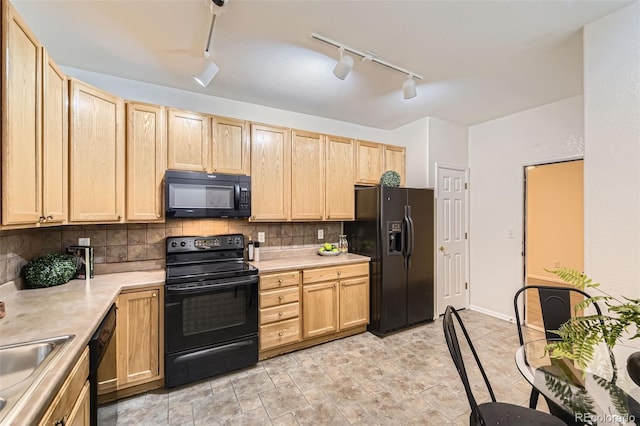 4221 S Blackhawk Cir Unit 7G, Aurora, CO 80014 - kitchen featuring black appliances, light brown cabinets, rail lighting, and backsplash