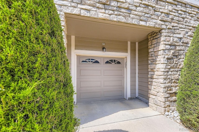 4221 S Blackhawk Cir Unit 7G, Aurora, CO 80014 - garage with driveway