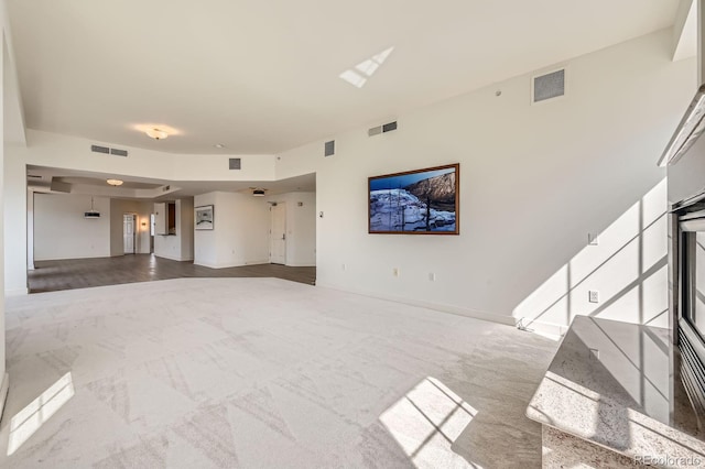 475 W 12th Ave Unit 9A, Denver, CO 80204 - carpeted spare room featuring baseboards