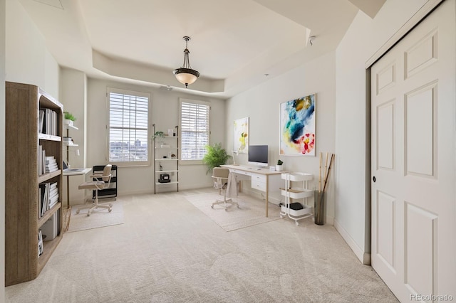 475 W 12th Ave Unit 9A, Denver, CO 80204 - home office with a tray ceiling, carpet flooring, and baseboards