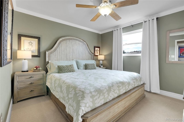 bedroom with ceiling fan, light carpet, and ornamental molding