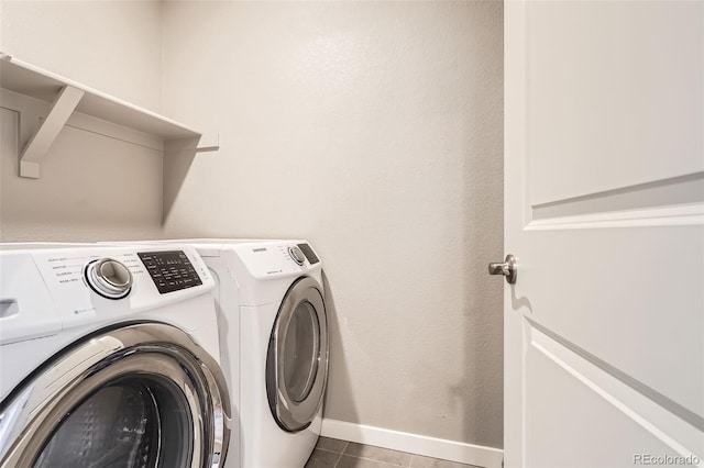 17341 Red Cosmos Pt, Parker, CO 80134 - laundry room featuring independent washer and dryer, laundry area, baseboards, and tile patterned floors