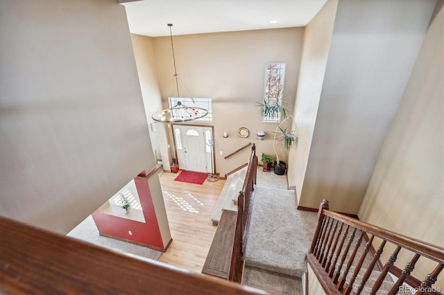 foyer with wood finished floors and baseboards