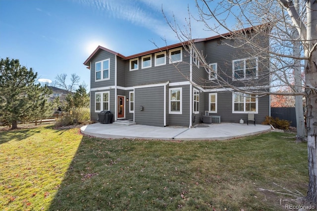 back of house with a yard, a patio area, fence, and central AC unit