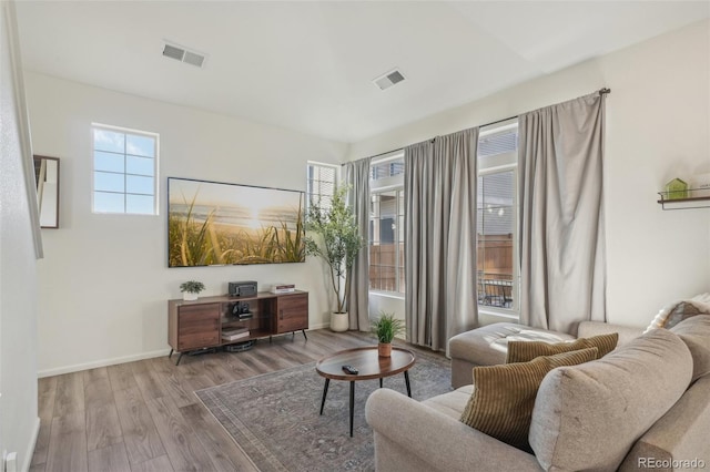 living area featuring light hardwood / wood-style floors