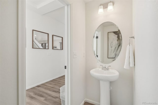 bathroom featuring hardwood / wood-style flooring