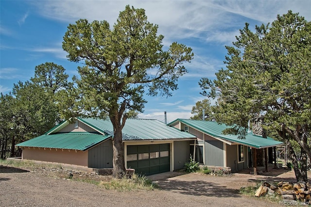 view of front of house with a garage