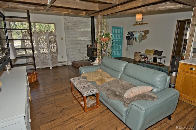 living room with dark wood-type flooring and a wood stove