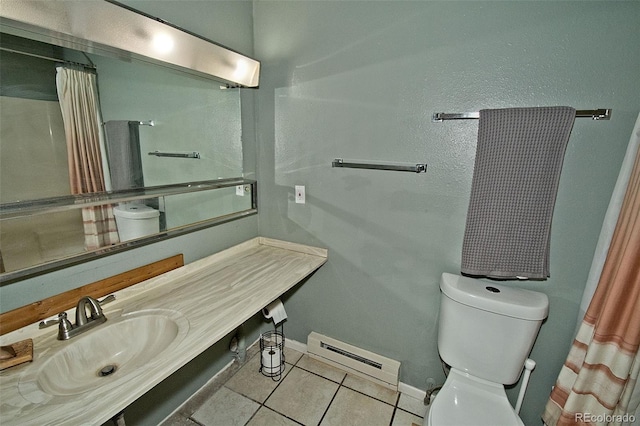 bathroom featuring sink, a baseboard radiator, tile patterned floors, and toilet