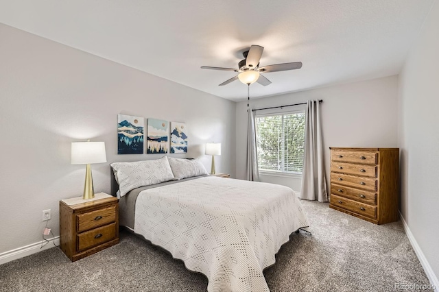 bedroom with carpet, a ceiling fan, and baseboards