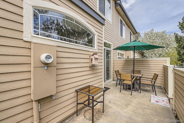 view of patio featuring outdoor dining area