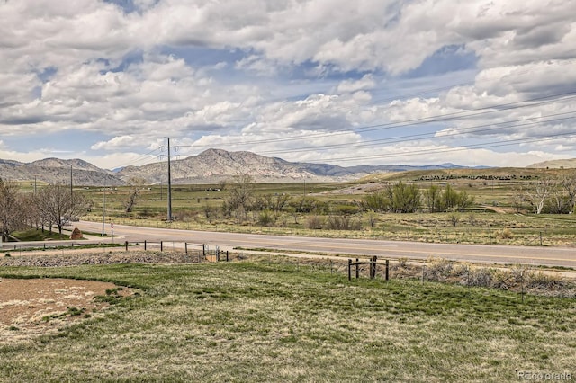 mountain view featuring a rural view