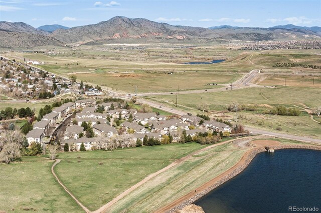 bird's eye view featuring a water and mountain view